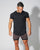Man i svart PureZ Pulse Signature Tee med Polygiene som motverkar svettlukt